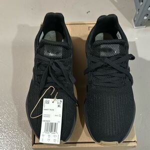 Adidas black tennis/running shoes Very popular “SwiftRun” style very gently worn